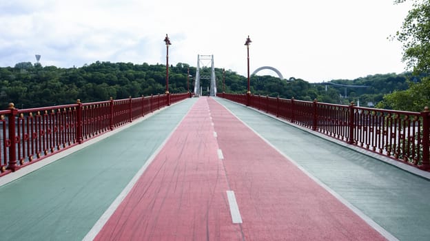 Park pedestrian bridge over the Dnieper River, which connects the central part of Kiev with the park area and the beaches of Trukhanovy Island. Without people