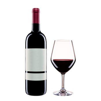 Close up of bottle and goblet of red wine isolated on white background. Food drinks.