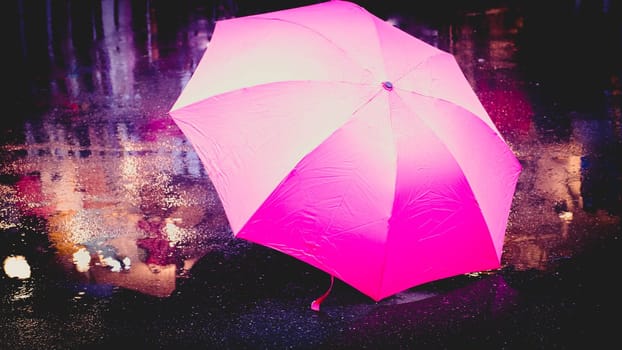 Pink Umbrella after the rain. Pink umbrella on the wet