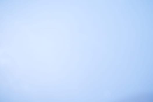 Horizontal image of an empty sky blue background. Light Bluish Color Abstracts and backgrounds of Glossy Plastic Paper Sheets Board design element copy space.