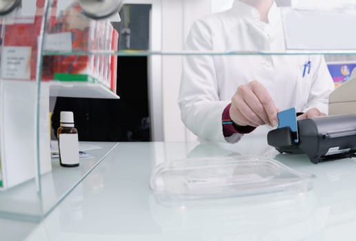 young pharmacist suggesting medical drug to buyer in pharmacy drugstore