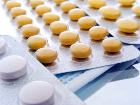 different color pillsDrugs and medicines
