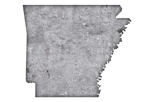 Map of Arkansas on weathered concrete