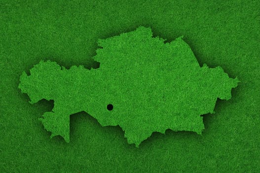 Map of Kazakhstan on green felt
