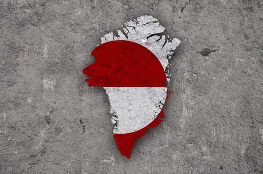 Map and flag of Greenland on weathered concrete