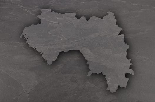 Map of Guinea on dark slate