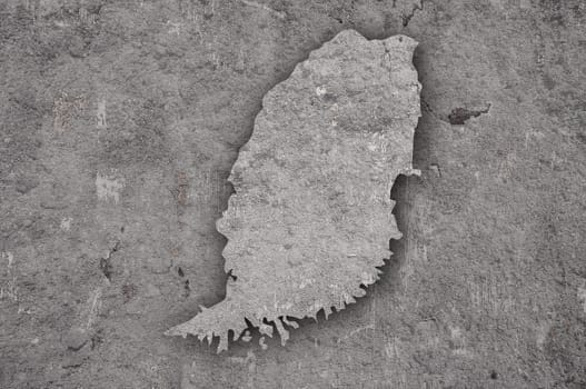 Map of Grenada on weathered concrete