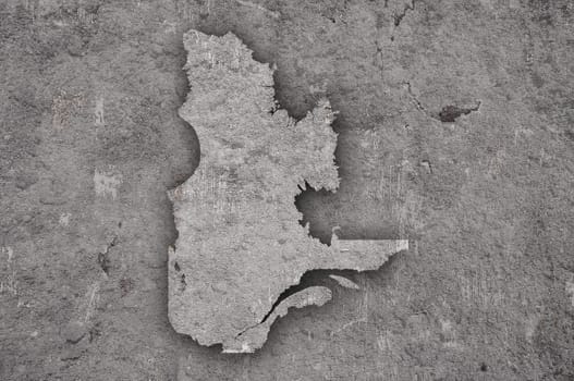 Map of Quebec on weathered concrete