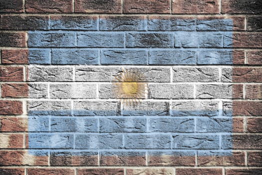 An Argentina flag on a brick wall background