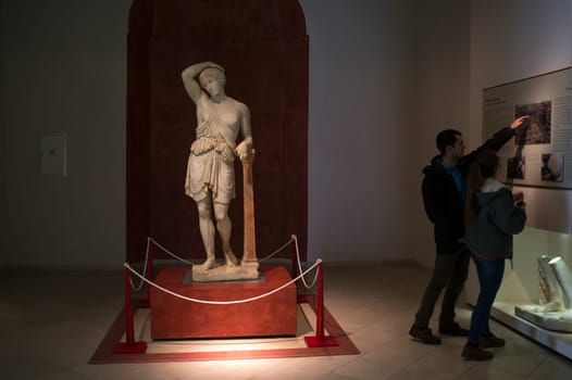 Ecija, Spain - April 21th, 2019: Visitors couple at Ecija Municipal Museum of History, Seville, Spain