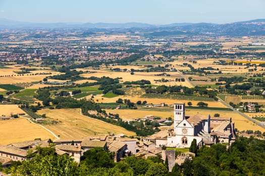 Assisi village in Umbria region, Italy. The town is famous for the most important Italian St. Francis Basilica (Basilica di San Francesco)