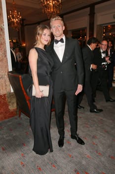 Andre Schuerrle with girlfriend Montana Yorke,charity event Blauer Ball 2015 at the Hotel Atlantic,Hamburg,11.04.2015