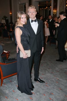Andre Schuerrle with girlfriend Montana Yorke,charity event Blauer Ball 2015 at the Hotel Atlantic,Hamburg,11.04.2015