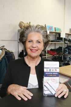 Hannelore Lay,Marie Amiere with acquaintances and friends at Chairty Shopping in the Outlet Store of The Sitftung Kinderjahre,Hamburg,28.03.2015