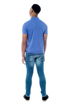 Full length of a young man looking at something