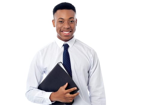 Male business executive holding business file