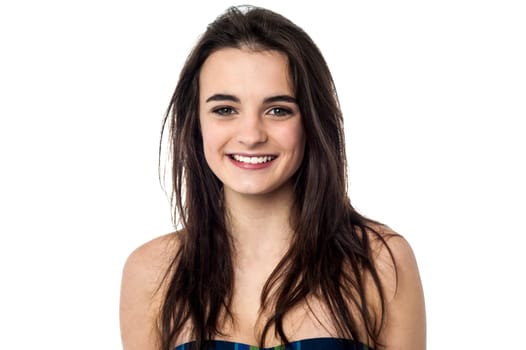 Attractive young flirtatious girl in sexy strapless dress.