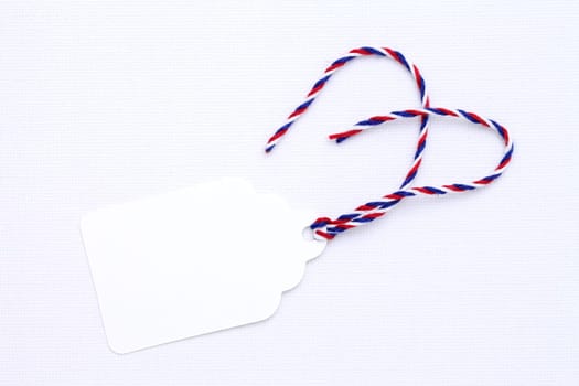 blank tag with colorful string