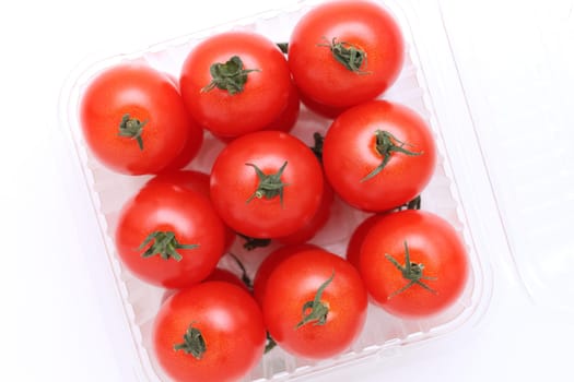 cherry tomatoes in a plastic container