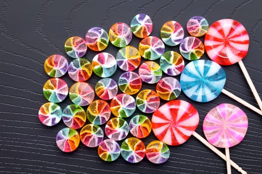 colorful candy on black background