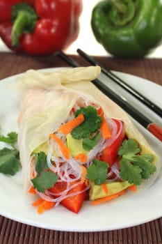 Rice paper stuffed with glass noodles,carrots,peppers and coriander