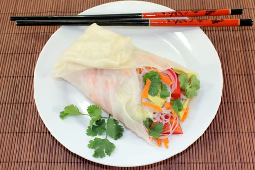 Rice paper stuffed with glass noodles,carrots,peppers and coriander