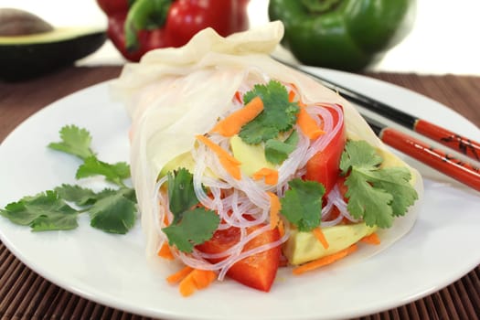 Rice paper stuffed with glass noodles,carrots,peppers and coriander