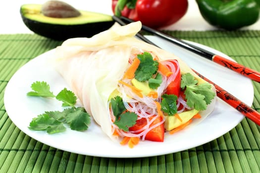 Rice paper stuffed with glass noodles,carrots,peppers and coriander