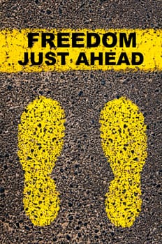 Conceptual image with yellow paint footsteps on the road in front of horizontal line over asphalt stone background. Word XXXXXXXX