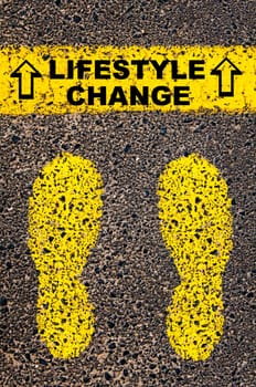 Conceptual image with yellow paint footsteps on the road in front of horizontal line over asphalt stone background. Word XXXXXXXX