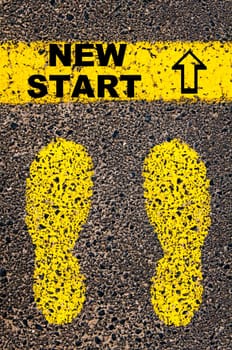 Conceptual image with yellow paint footsteps on the road in front of horizontal line over asphalt stone background. Word XXXXXXXX