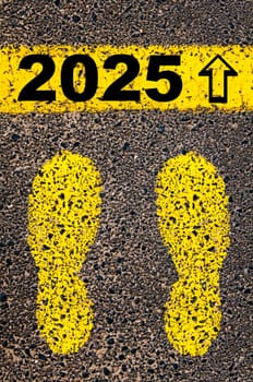 Conceptual image with yellow paint footsteps on the road in front of horizontal line over asphalt stone background. Word XXXXXXXX