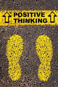 Conceptual image with yellow paint footsteps on the road in front of horizontal line over asphalt stone background. Word XXXXXXXX