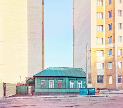 Contrast between old and new house, Russia