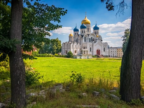 Church in Russia. Summer landscape. Sky with blue clouds in background