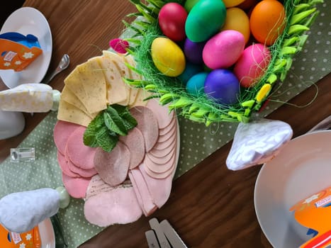 Traditional easter breakfast table with decorated eggs