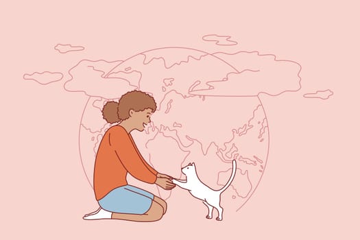 People and nature, save earth concept. Small positive black girl sitting with little white cat kitten and planet earth on background vector illustration