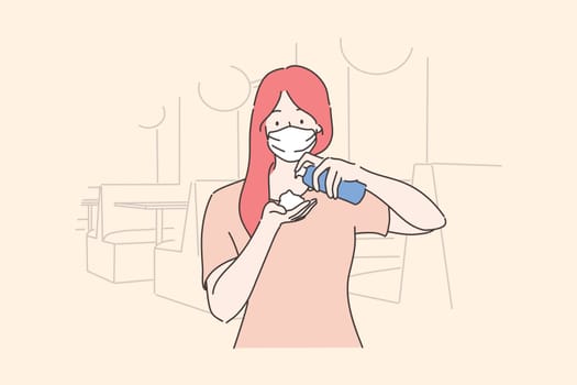 Healthcare, quarantine, protection, coronavirus infection concept. Young woman girl with medical face mask pouring antiseptic on hands. Preventive measures from Covid19 desease and 2019ncov biohazard.