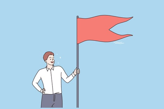 Winner, success, Business reaching goal concept. Young smiling businessman cartoon character standing holding red flag in hands feeling happy