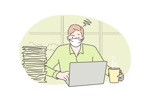 Freelance, quarantine, fatigue, coronavirus, business concept. Young overloaded businessman boy freelancer with medical face mask works remotely at home. Mental stress overworking at 2019ncov lockdown