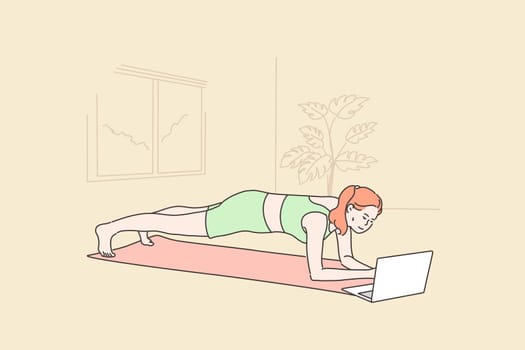 Sport, yoga, fitness concept. Young happy woman girl athlete in sportswear cartoon character doing workout standing in bar and using laptop in living room at home. Active lifestyle and body healthcare