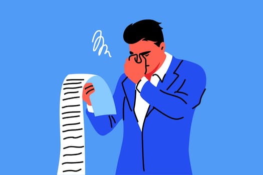 Business, mental stress, bankruptcy, debt concept. Young stressful sad businessman clerk manager holding long list of financial bills worried about money debts. Financial crisis and credit payment.