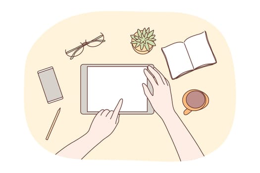 Technology, mobile, social media, business concept. Human character designer hands using blank tablet in office workplace for jub web network communication. Digital technological gadgets in daily life