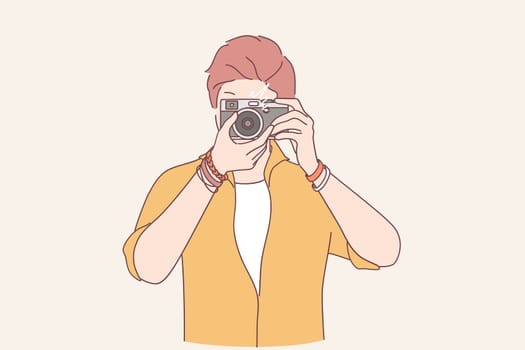 Creativity, photograph, artist concept. Young man freelancer photographer cartoon character standing making shot to camera vector illustration