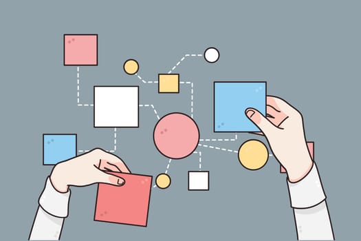 Business strategy, planing, processes concept. Hands of businessman changing papers business steps for making one strategy for development over grey table background, top view