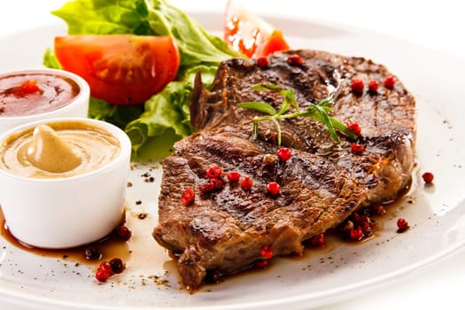 Grilled steaks and vegetables