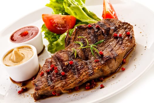Grilled steaks and vegetables