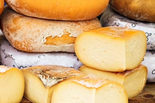 Cheese on a traditional craftsman market.Horizontal image.