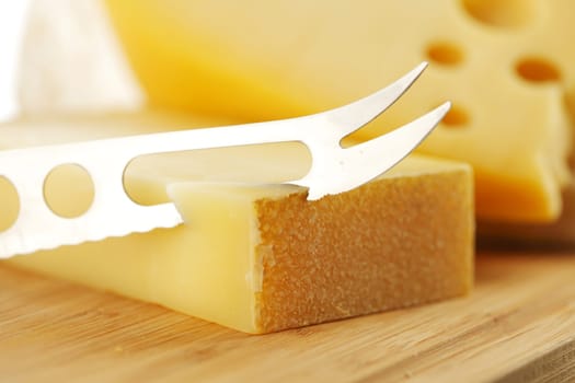 cheese with a cheese knife
