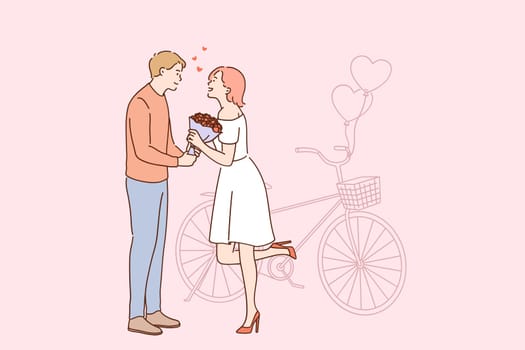 Love and romantic dating concept. Young loving man cartoon character giving red flowers bouquet to his girlfriend during date vector illustration